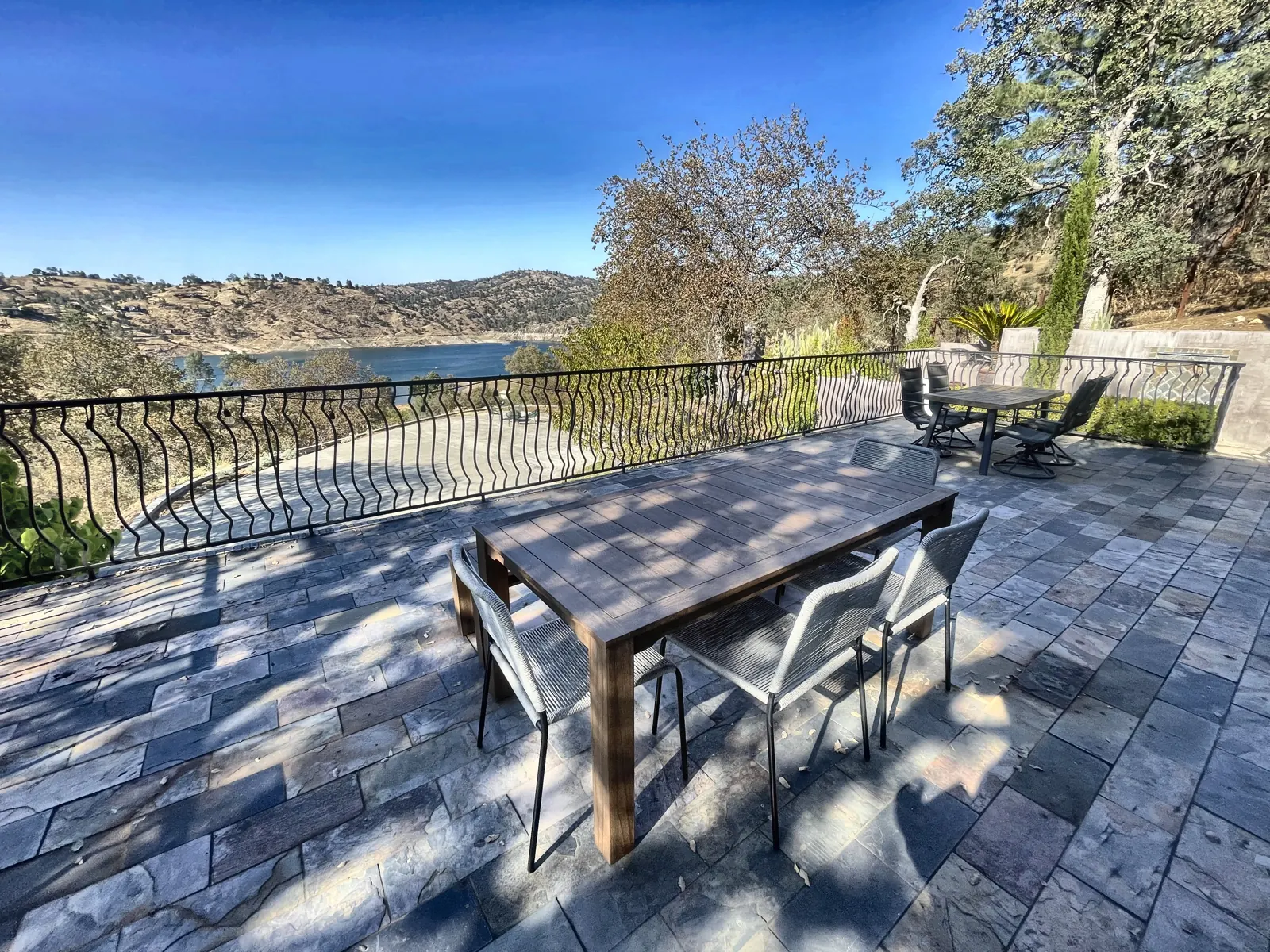 Terrace with dining tables overlooking Millerton Lake